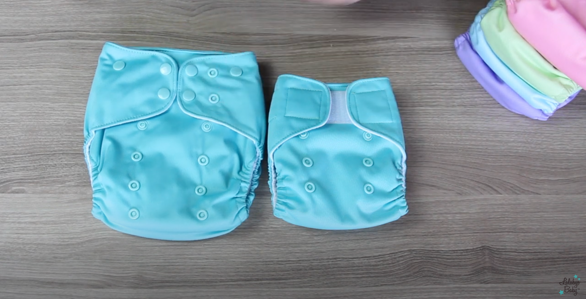 Load video: Our newborn diaper video describes how to use the diaper in detail.