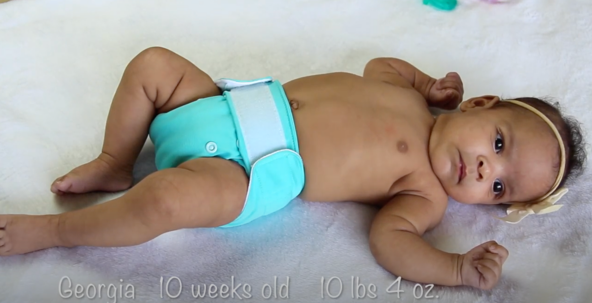 Load video: How to change a cloth diaper 101 video